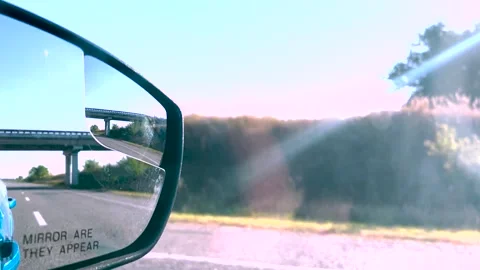 Summer road trip. View in the rear view mirror of a car. Road trip. Summer car Video stock 261220060