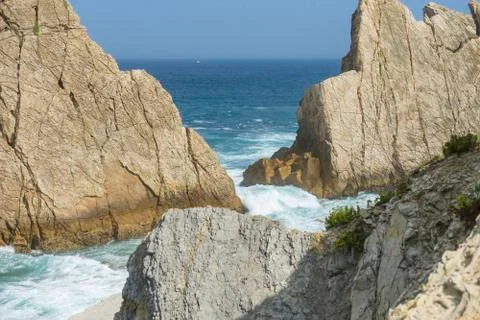 Summer, Rocks on the beach. Dramatic view of rocky coastline in Santander, Sp Stock Photos