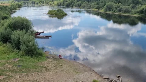 Summer rural landscape on the river on a cloudy day Video stock 247705921