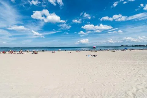 Summer scene at a public beach Stock Photos