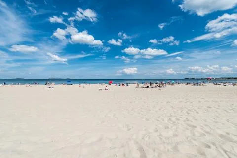 Summer scene at a public beach Stock Photos