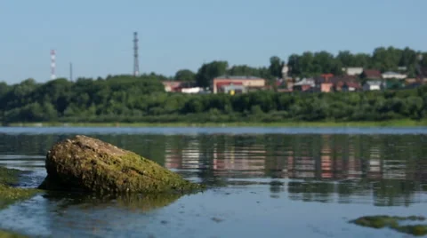 Summer scenic view of small town near river Stock Footage