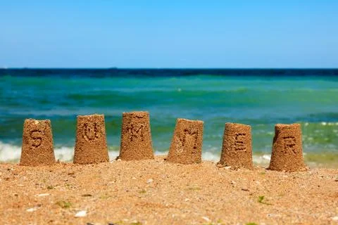 Summer script on sand towers Foto stock