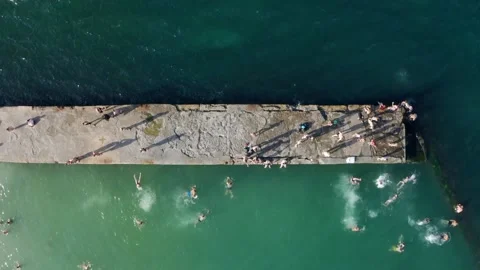 Summer sea swimmer beach people jumping water Stock-Footage 135004953