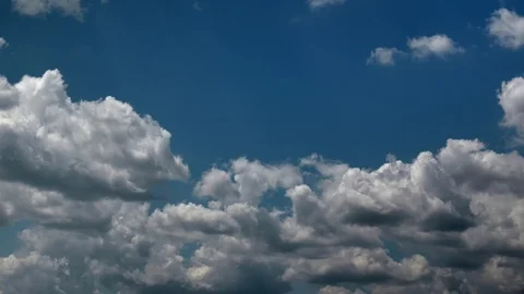 Summer soft heavenly clouds fly across a royal blue sky. 4k Timelapse. 스톡 동영상 116137219