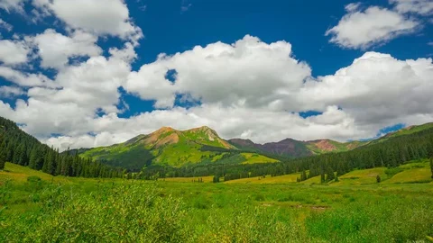 Summer Spring Green Mountain Valley moving Cloud Shadows Time Lapse 4K Stock Footage 129352737