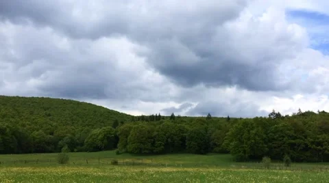 Summer storm clouds close up above a mountain forest Stock Footage 63100694