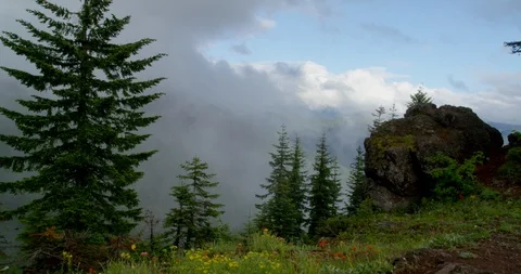 Summer storm passing through rugged terrain below Mt. Jefferson in Oregon Stock Footage 86541540