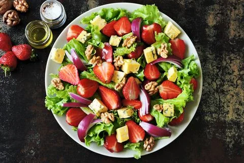 Summer strawberry salad with blue cheese. Stock Photos
