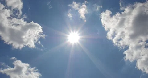 Summer sun and clouds on the blue sky. Stock Footage 137379141