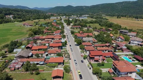 Summer sunlight over red rooftops of a Bulgarian village Stock-Footage 344626649