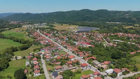 Summer sunlight over red rooftops in a Bulgarian village Stock-Footage 344633234