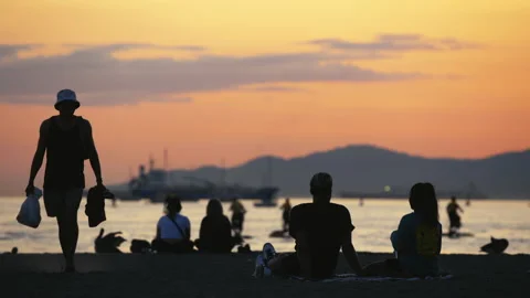 Summer Sunset Beach Hang-outs Among Friends 1 Stock Footage 157932170