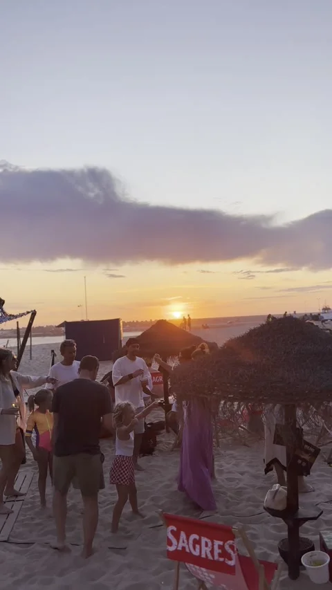 Summer sunset with dj and dancing people at Praia dos Pescadores Ericeira Stock Footage 304883093