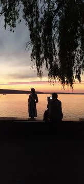 Summer sunset on lake Stock Photos