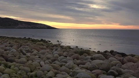 Summer sunset over the Barents Sea. Kola Peninsula, Murmansk region (tamlaps) Video stock 282029736