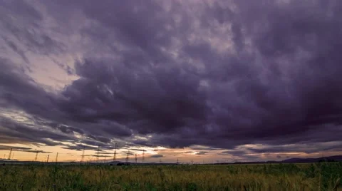 Summer Sunset Over The Field. Time lapse.mp4 Stock Footage 64150476