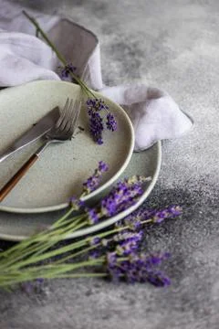 Summer table setting with lavender flowers Stock Photos
