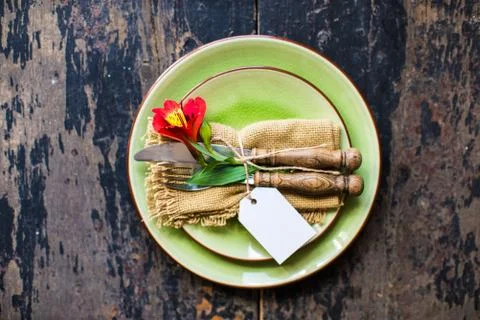 Summer table setting with red lilly Stock Photos