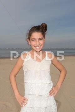 Summer teen girl in white dress posing Stock Photos
