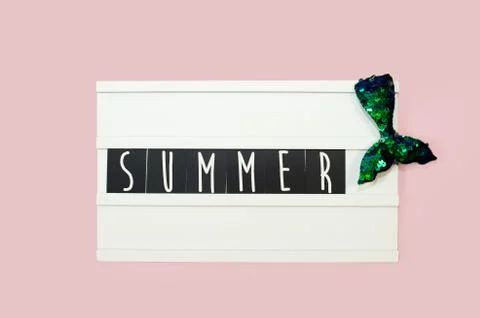 Summer - text on a display lightbox on pink bright background. Stock-Fotos