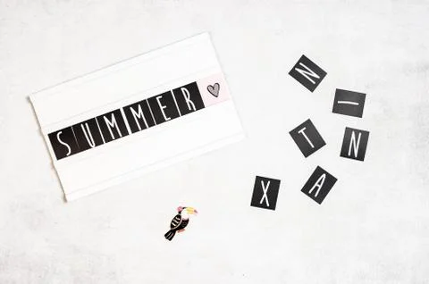 Summer text in a light box. Box isolated over white background. Stock Photos