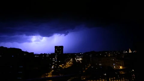 Summer thunderstorm is hitting the city with thunders and lightnings. Stock Footage 154988645