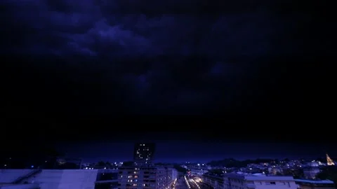 Summer thunderstorm is hitting the city with thunders and lightnings. Stock Footage 154988661