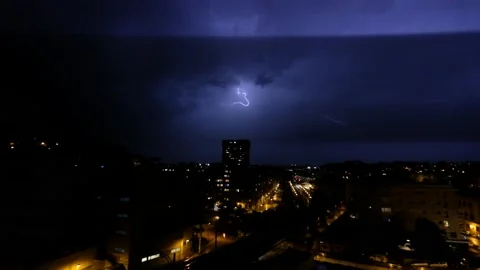 Summer thunderstorm is hitting the city with thunders and lightnings. Stock Footage 154988669