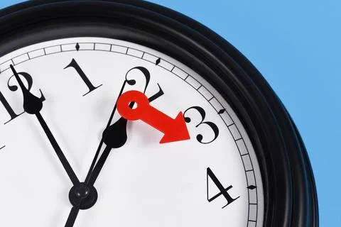 Summer time change for daylight saving in Europe concept Red arrow symbolizing Stock Photos