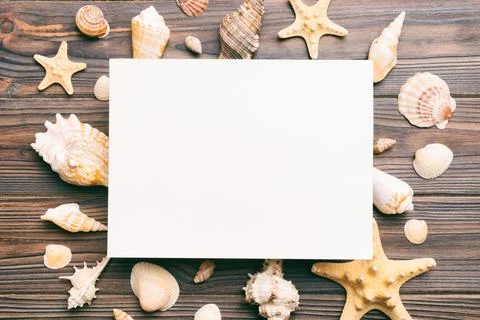 Summer time concept with blank greeting card and blank white paper on color.. Stock Photos