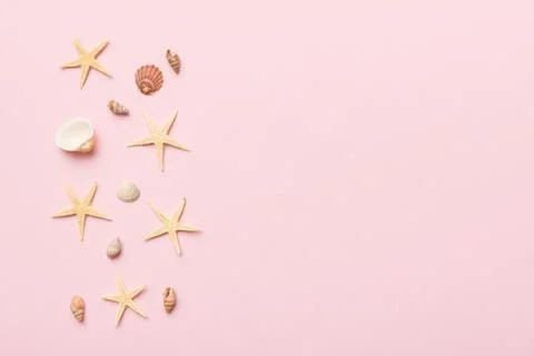 Summer time concept Flat lay composition with beautiful starfish and sea shel Stock Photos