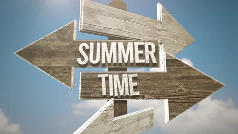 Summer Time with direction indicator on road with blue sky 動画素材 242405423