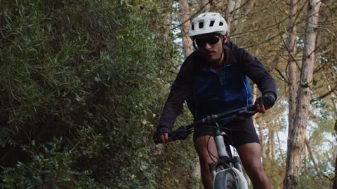 Summer Time Mountain Biking Young Biker in a Forest in Slow Motion Stock Footage 260260285