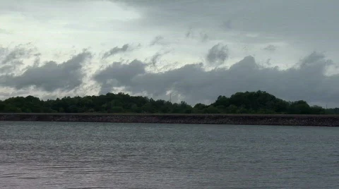 Summer Timelapse 06 Dark clouds over lake shore Видео 874207