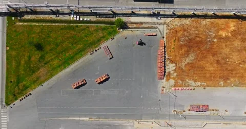 Summer Top Down Shot Worker Sorting Pallets In Large Metal Processing Industrial Stock Footage 300445644