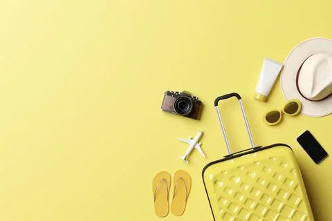 Summer travel accessories flat lay on yellow background Stock Illustration