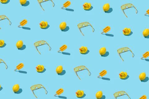 Summer trendy seamless pattern with objects sunlit on abstract blue background Stock Photos