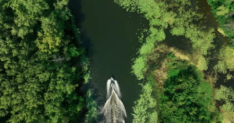 Summer trip by speedboat on small river channels, aerial view, picturesque Stock Footage 263124188