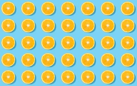 Summer tropical pattern of orange circles on a blue background Stock Illustration