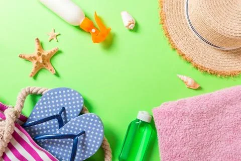 Summer vacation background with copy space. Flat lay photo on color table, tr Stock Photos