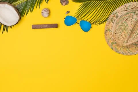 Summer vacation composition. Hat, palm leaves, sunglasses and other stuff Stock Photos