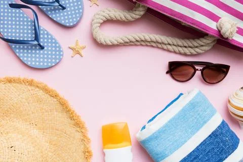 Summer vacation concept flat lay. beach accessories and towel top view. Space Stock Photos