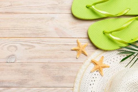 Summer vacation concept flat lay. straw hat beach accessories and towel top v Stock Photos