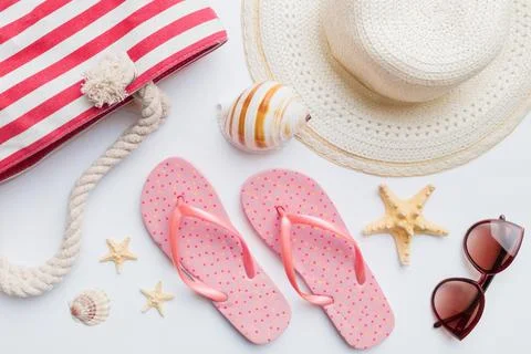 Summer vacation concept flat lay. beach accessories and towel top view. Space Stock Photos