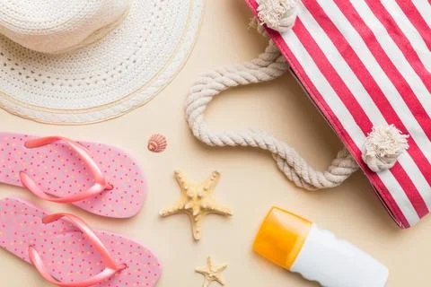 Summer vacation concept flat lay. beach accessories and towel top view. Space Stock Photos
