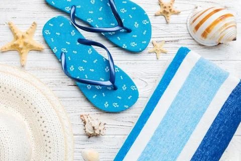 Summer vacation concept flat lay. beach accessories and towel top view. Space Stock Photos