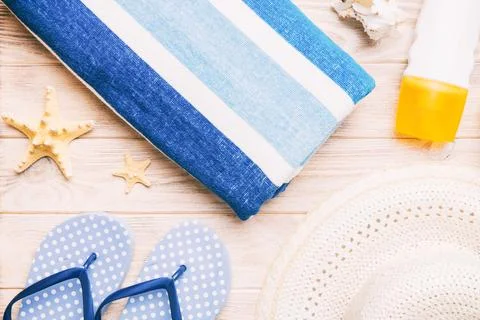 Summer vacation concept flat lay. beach accessories and towel top view. Space Stock Photos