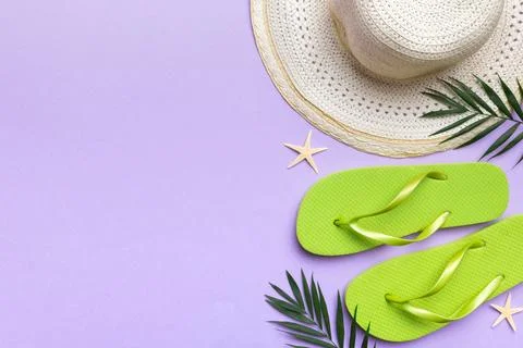 Summer vacation concept flat lay. straw hat beach accessories and towel top v Stock Photos