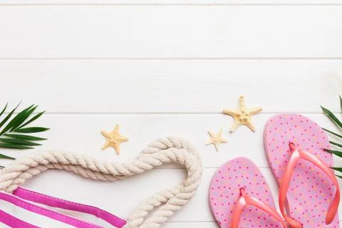 Summer vacation concept flat lay. beach accessories and towel top view. Space Stock Photos
